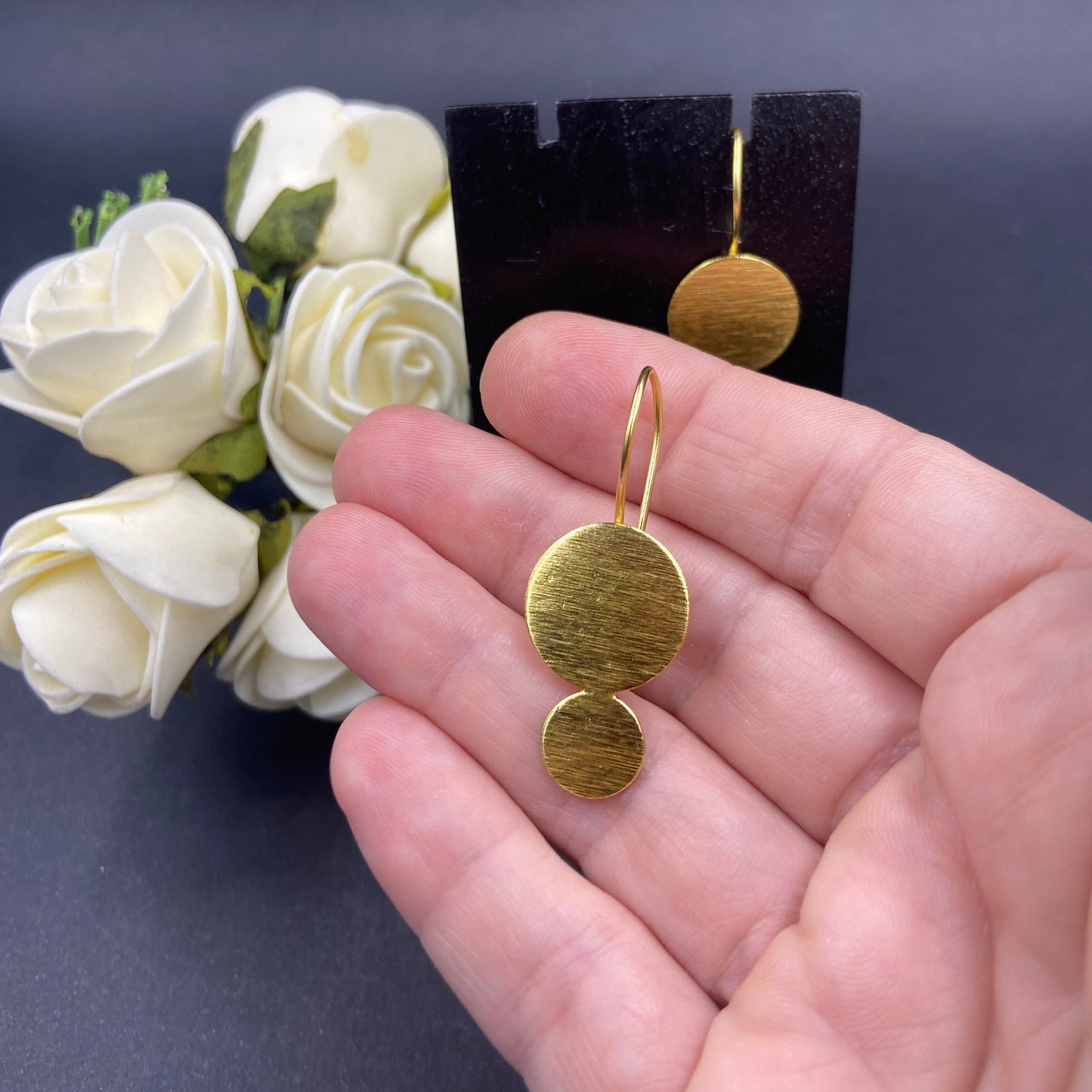 Button earring with 18kt gold plated chain