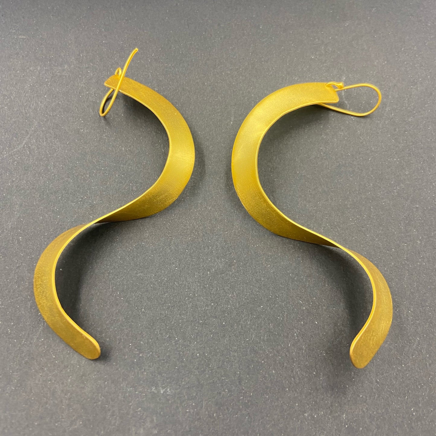 CINEMA earrings plated in 18kt gold