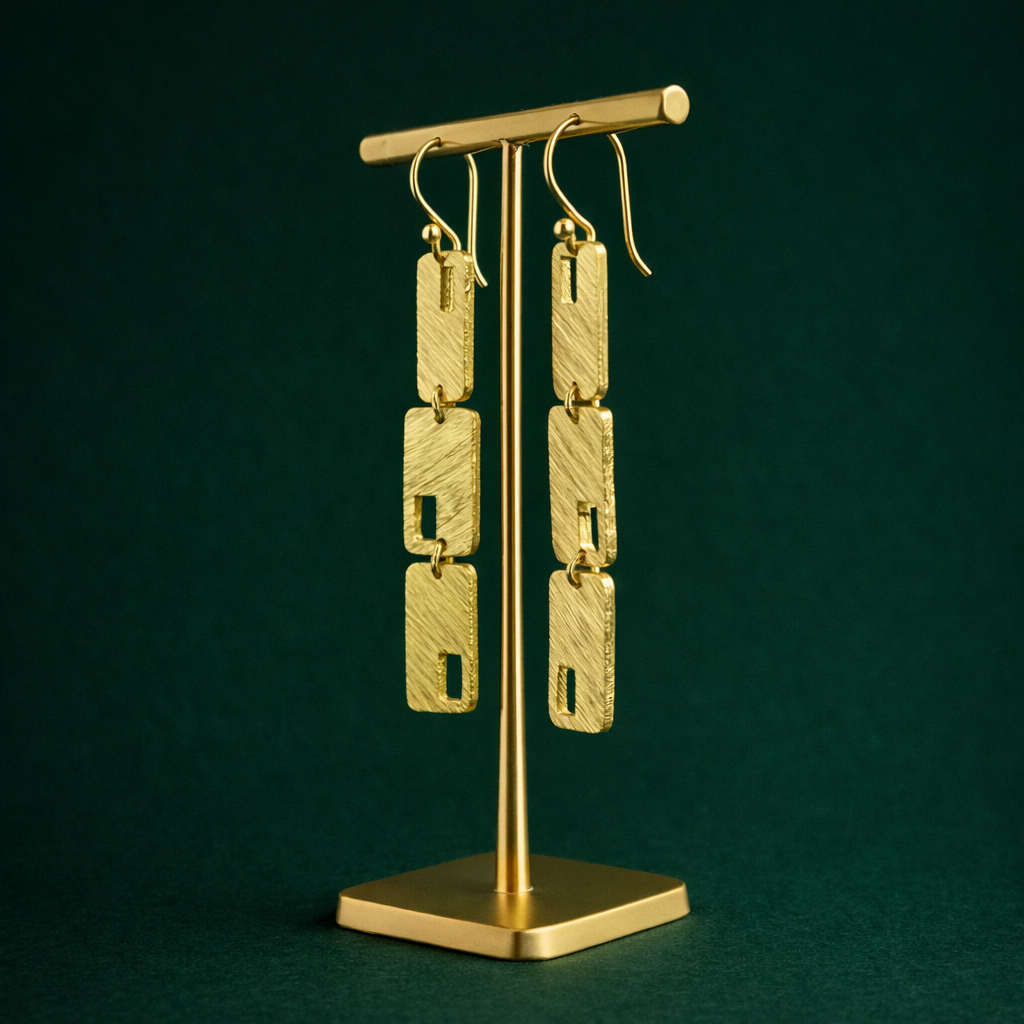 Pendientes EL BESO bañados en oro - Diseño con carácter