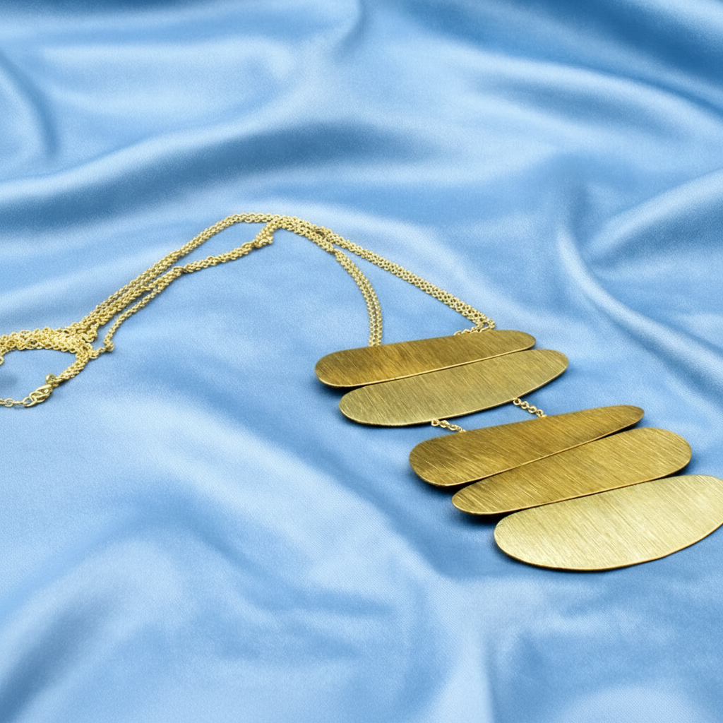 PALEOLITHIC long necklace plated in 18kt gold