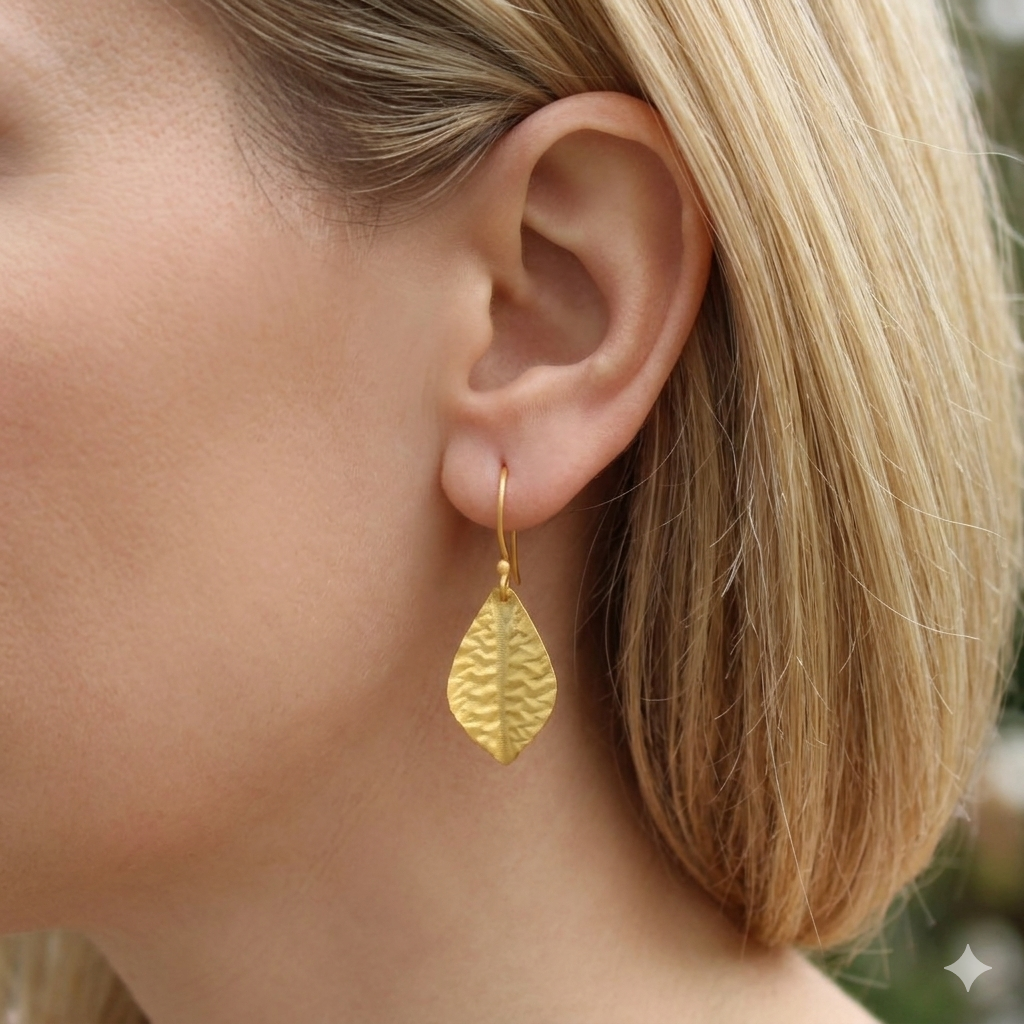 EARRINGS WITH THREE LEAVES PLATED IN GOLD AND RHODIUM