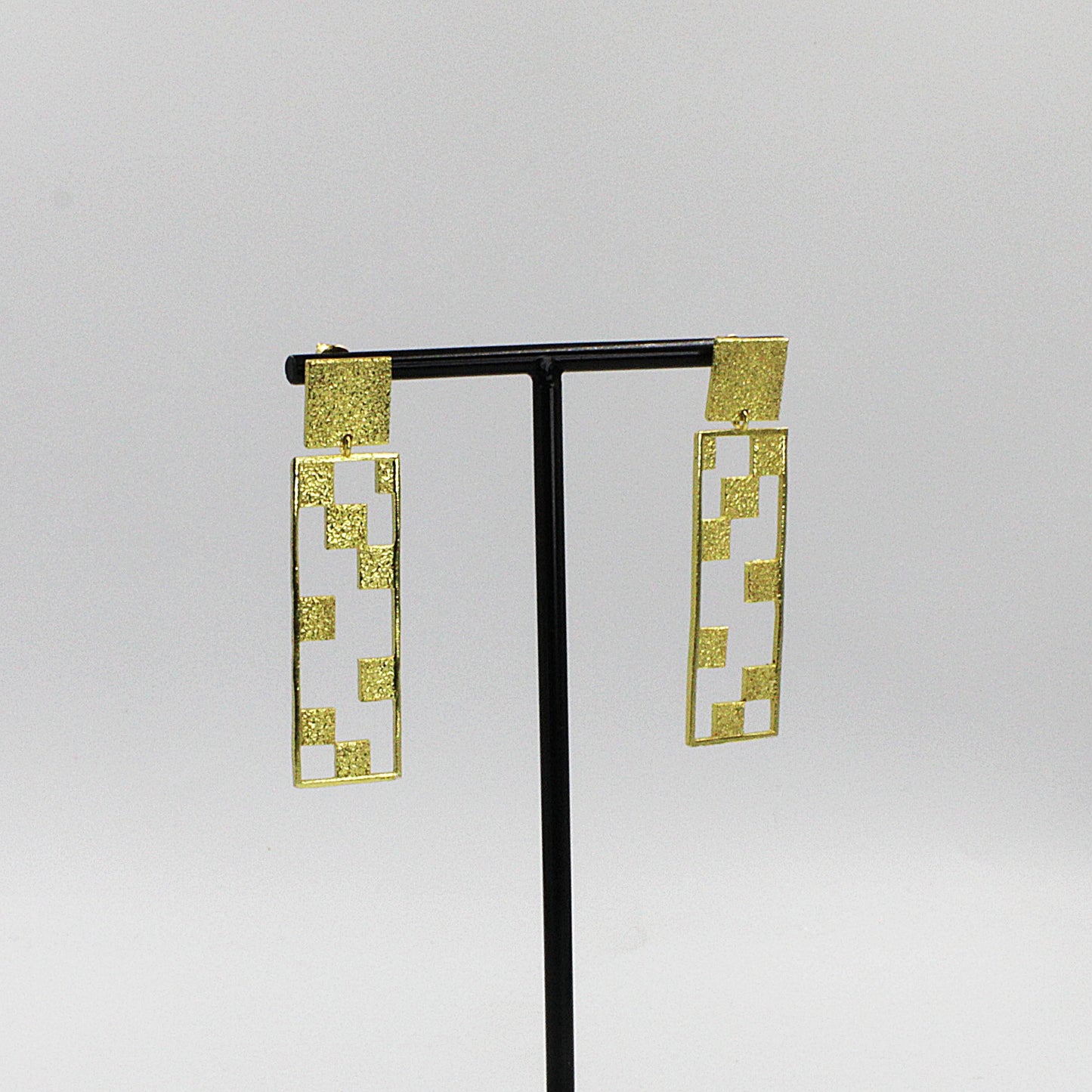 CINEMA earrings plated in 18kt gold