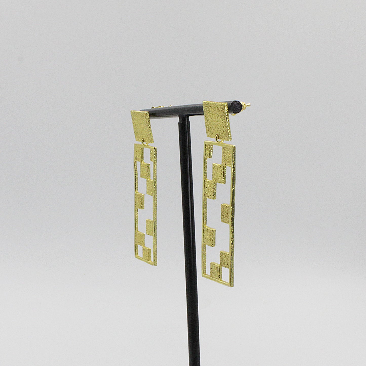 CINEMA earrings plated in 18kt gold