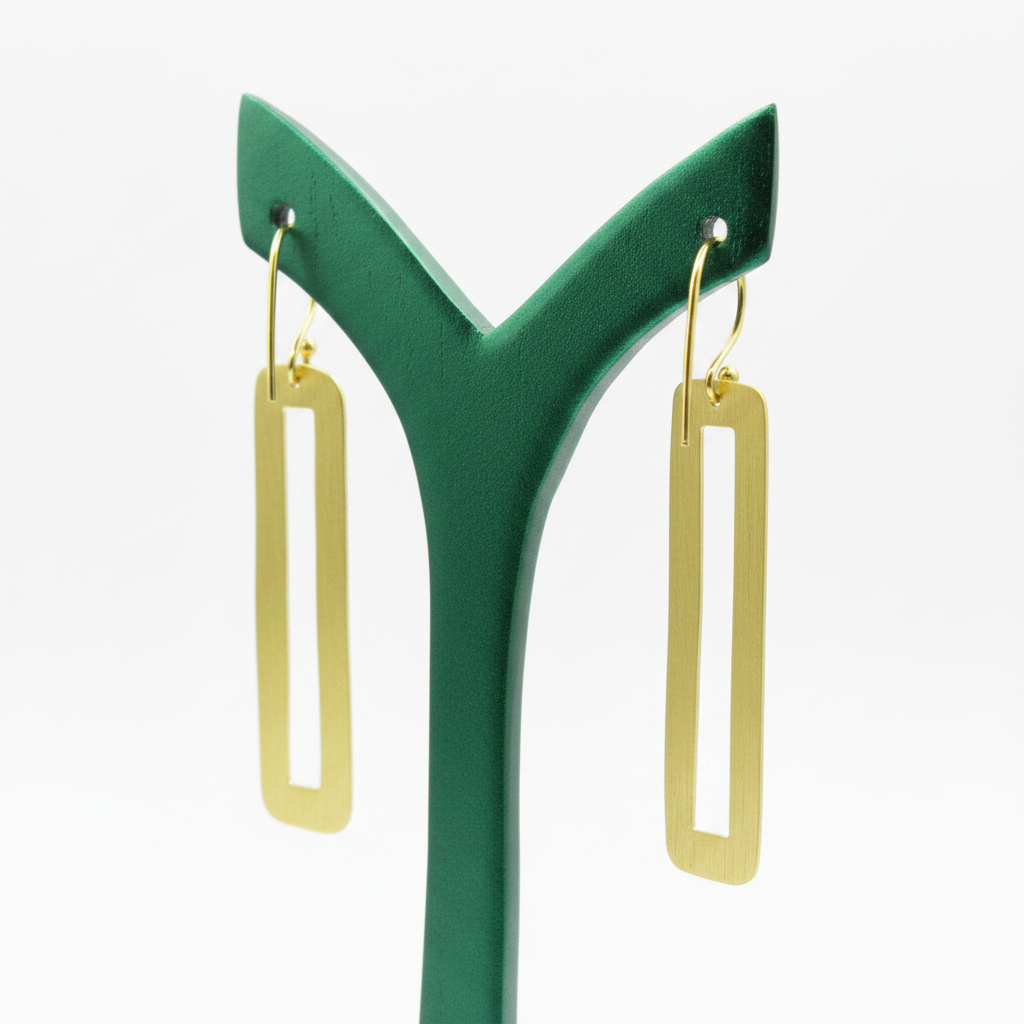 CINEMA earrings plated in 18kt gold