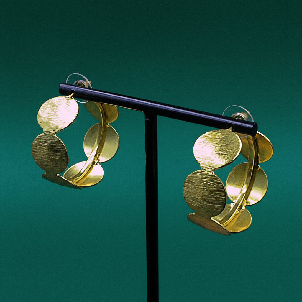 CINEMA earrings plated in 18kt gold