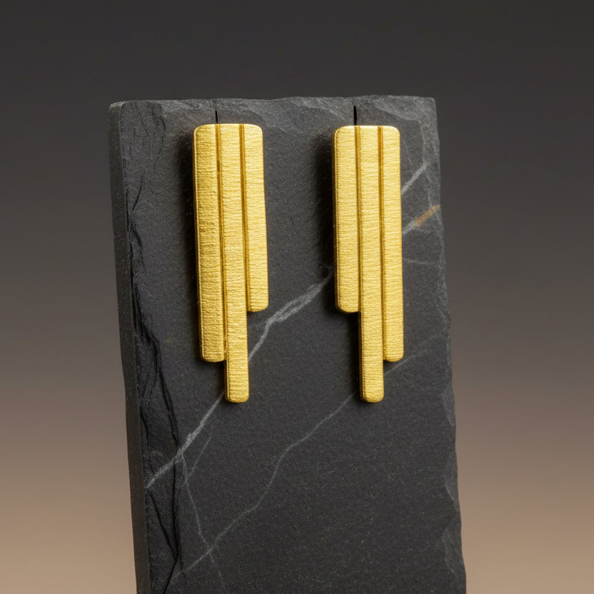 Pendientes LACRIME bañados en oro - Diseño con carácter