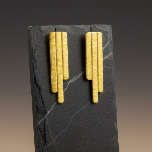 CINEMA earrings plated in 18kt gold