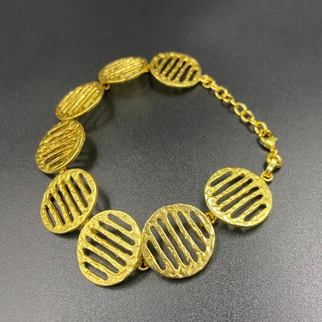 CINEMA earrings plated in 18kt gold